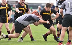 Sophomore Jon Ekron, member of the Hudson Rugby Club, plays in the Midwest Rugby Tournament in Elkhart, Indiana, the weekend of May 6-7.