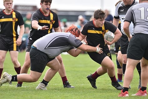Sophomore Jon Ekron, member of the Hudson Rugby Club, plays in the Midwest Rugby Tournament in Elkhart, Indiana, the weekend of May 6-7.