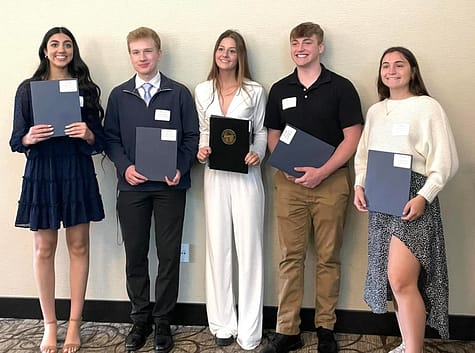 Teen Board representative Bella Leonardi (center) captures a moment with fellow SHS seniors at the county honors breakfast earlier this month. Leonardis promotion of Noor Chima, Aaron Sears, Corey Teuton and Ella Deevers earned all four Portage County Teen of the Month distinction during different months of the school year.