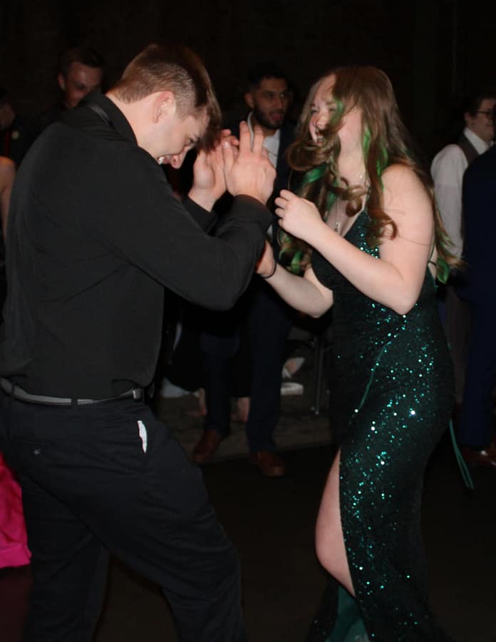 Senior Corey Teuton and his date, junior Kristina Koyan, enjoy a dance at prom.