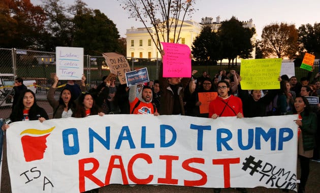 People protest against U.S. president-elect Donald Trump in front of the White House in Washington, U.S., November 10, 2016. REUTERS/Kevin Lamarque
